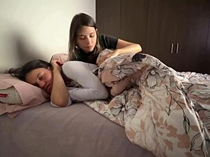 Two Colombian amateur babes got cozy in bed, groping and touching each other intimately until reaching orgasm.