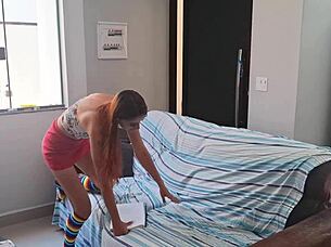 An older man unexpectedly joins a young redhead in the bathroom, exploring submissive ass worship in pantyhose.