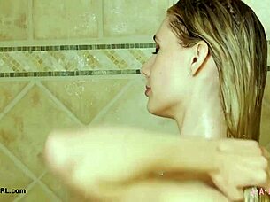 Blonde aspiring model takes refreshing shower during photoshoot session