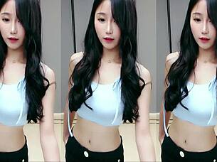 chinese asian girl shows cute dancing moves