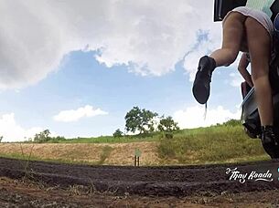 Hey, check out this naughty chick in short skirt no panties opening car trunk on highway