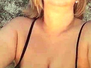 blonde milf with big natural tits spreads huge pussy lips and nipples on beach fetish