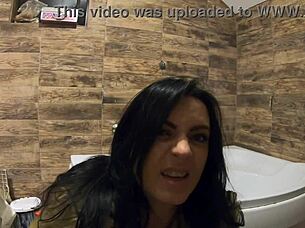 i can't believe this milf is peeing in the bathtub with fur coat and pantyhose on!