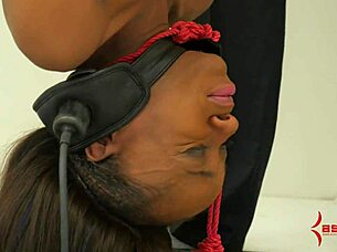 Suspended in bizarre bondage at the garage like raw meat forced into intense ass licking and cum eating with ebony doctor flair.