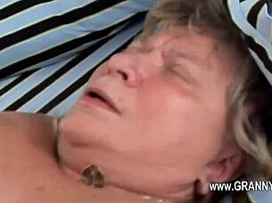 Enticing mature beauty hints at intense hardcore encounters with subtle erotic allure