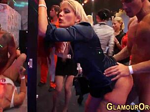 glamorous women perform oral acts in a group setting