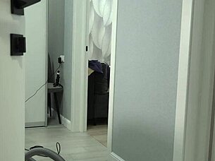 A chubby mature housewife struts around in a short robe, her thick ass and big saggy boobs jiggling freely.