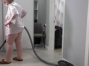 A chubby mature housewife struts around in a short robe, her thick ass and big saggy boobs jiggling freely.