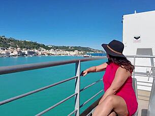 Woman in public place recalls her beach vacation memories