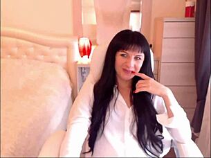 Watch small tit brunette Helga Muah aka Jessy in sexy strip and tease lingerie!