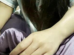 asian girl gives her boyfriend an amazing handjob in bedroom 🍆✋