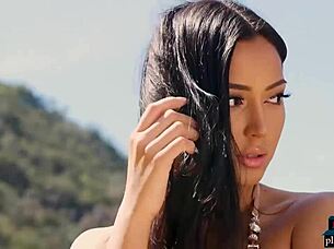 Petite mixed race asian model Alexandra poses in solo softcore lingerie striptease session