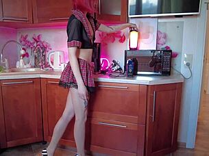 hey, check out this redhead chick deepthroating and sucking the dick of that fat old dude at home