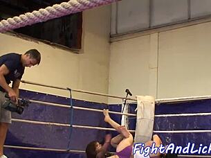 Skinny lesbians battle it out wrestling fiercely in the boxing ring for domination