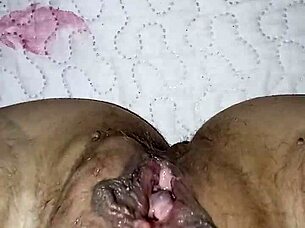 Gretala flashes her open pussy while he snores nearby in teasing display