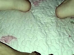 Gretala flashes her open pussy while he snores nearby in teasing display