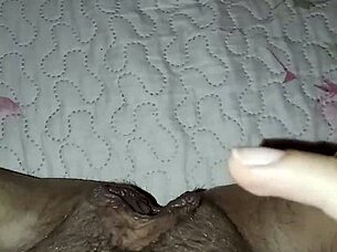 Gretala flashes her open pussy while he snores nearby in teasing display