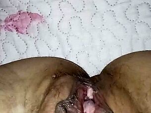 Gretala flashes her open pussy while he snores nearby in teasing display