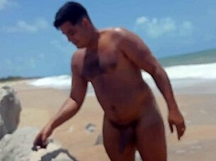 Video shows alpha male bending over and climaxing on the beach.