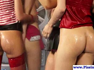 Kinky lesbian babes dive into wild pissing fetish with close-up tribbing action 😈