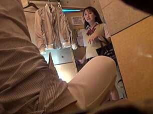 Hidden camera captures cute Asian beauty with big natural tits during intriguing massage session