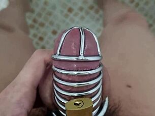 korslaveman peed while wearing a chastity belt on his cock in homemade solo