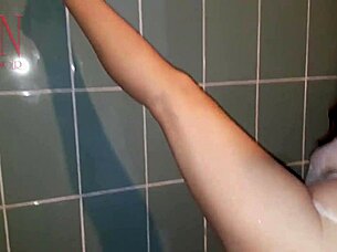 chick gets wet in shower with soaked panties and shirt on