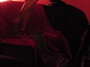 In a homemade German fetish scene, the mistress dominates with strapon and rimjob in latex attire.