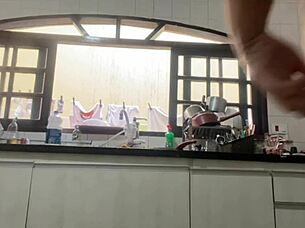 Exhibitionist Flashing Panties While Washing Dishes