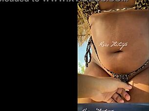 I love showing off my huge tanned ass in this tiny bikini at the beach