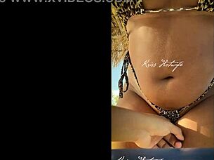 I love showing off my huge tanned ass in this tiny bikini at the beach