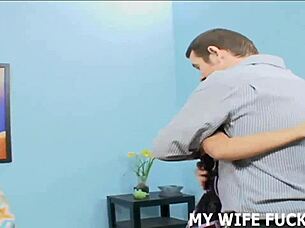 He watches as his wife dominates with big tits and femdom moves in cuckold play.