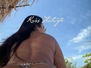 I love showing off my huge tanned ass in this tiny bikini at the beach