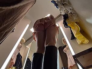 hidden camera captures hot blonde trying sexy clothes in public dressing room revealing naked body