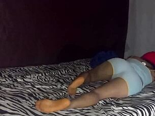 Couple rests on bed before fun in homemade video.