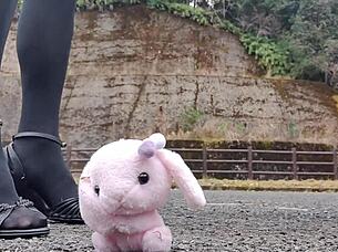 A Japanese crossdresser explores crush fetish with soft toy in Asian scene