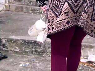 hey, the small-waist beauty with brown eyes heads up the street feeling excited outdoors