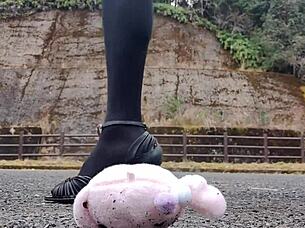 A Japanese crossdresser explores crush fetish with soft toy in Asian scene