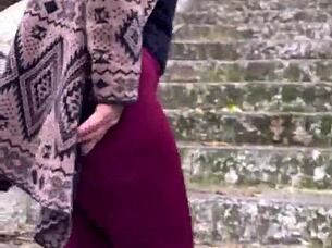 hey, the small-waist beauty with brown eyes heads up the street feeling excited outdoors