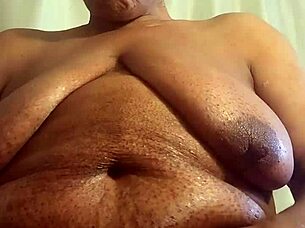 amateur ebony granny got horny fingering big tits and wet pussy before shower