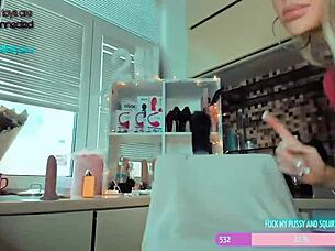 This tattooed bimbo girl dressed in costume fingers herself on webcam like a whore.