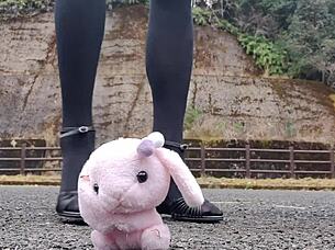 A Japanese crossdresser explores crush fetish with soft toy in Asian scene