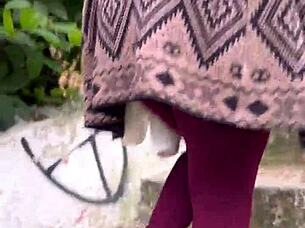 hey, the small-waist beauty with brown eyes heads up the street feeling excited outdoors