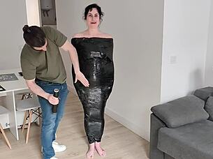 In this bts prep, milf gets into BONDAGE RESTRAINTS for filming.