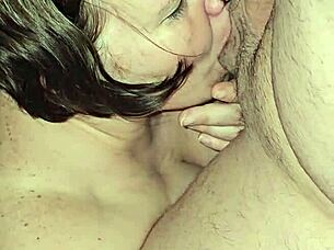 Milf with big tits casually sucks on cock