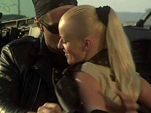 Blonde babe enjoys crazy passionate fucking with huge cock guy at the car scrapyard