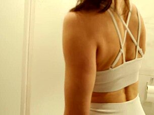 Cleaning lady spreads legs in bathroom