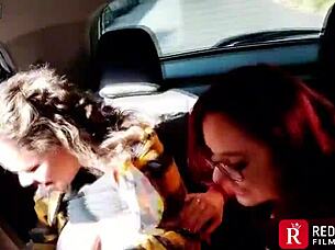 Thrilling car sex with two crazy women while everyone watches outside