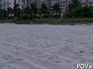 Young adult competes in a sucking contest game with intense action and excitement.