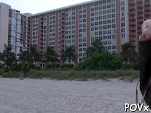 Young adult competes in a sucking contest game with intense action and excitement.